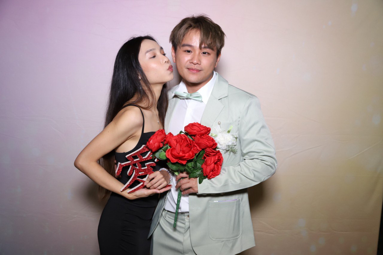 Guests with instant prints at Singapore wedding